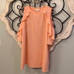 Never been worn, peach top with cutout shoulders